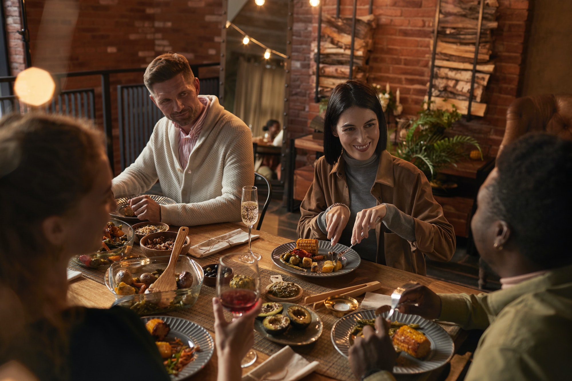 Adult People Enjoying Dinner Party