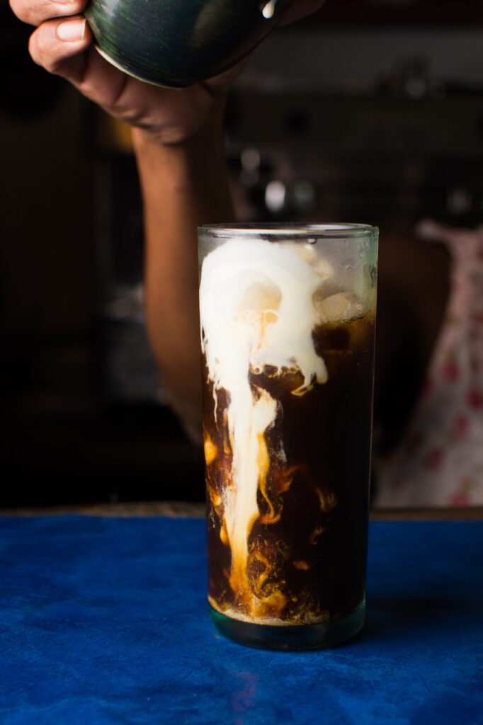Cold coffee with ice and milk. Cold brew
